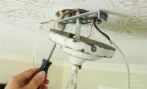 how to attach chandelier to ceiling junction box|how to mount a chandelier.